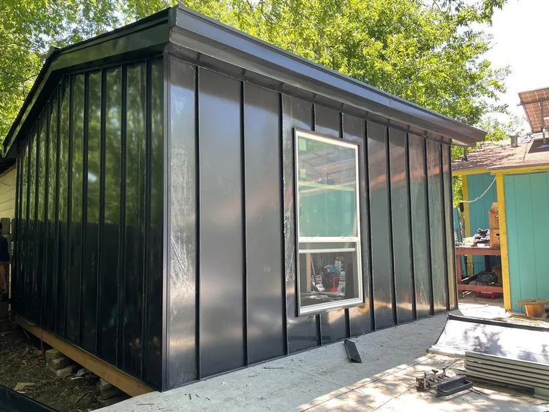 Black standing seam metal wall panels for Roof Inspection in Southampton